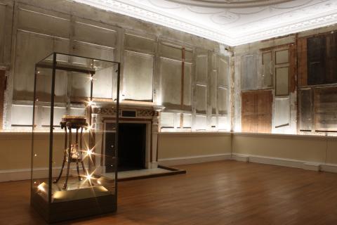 The tapestry room at Croome with plasterboard removed and dramatic lighting added